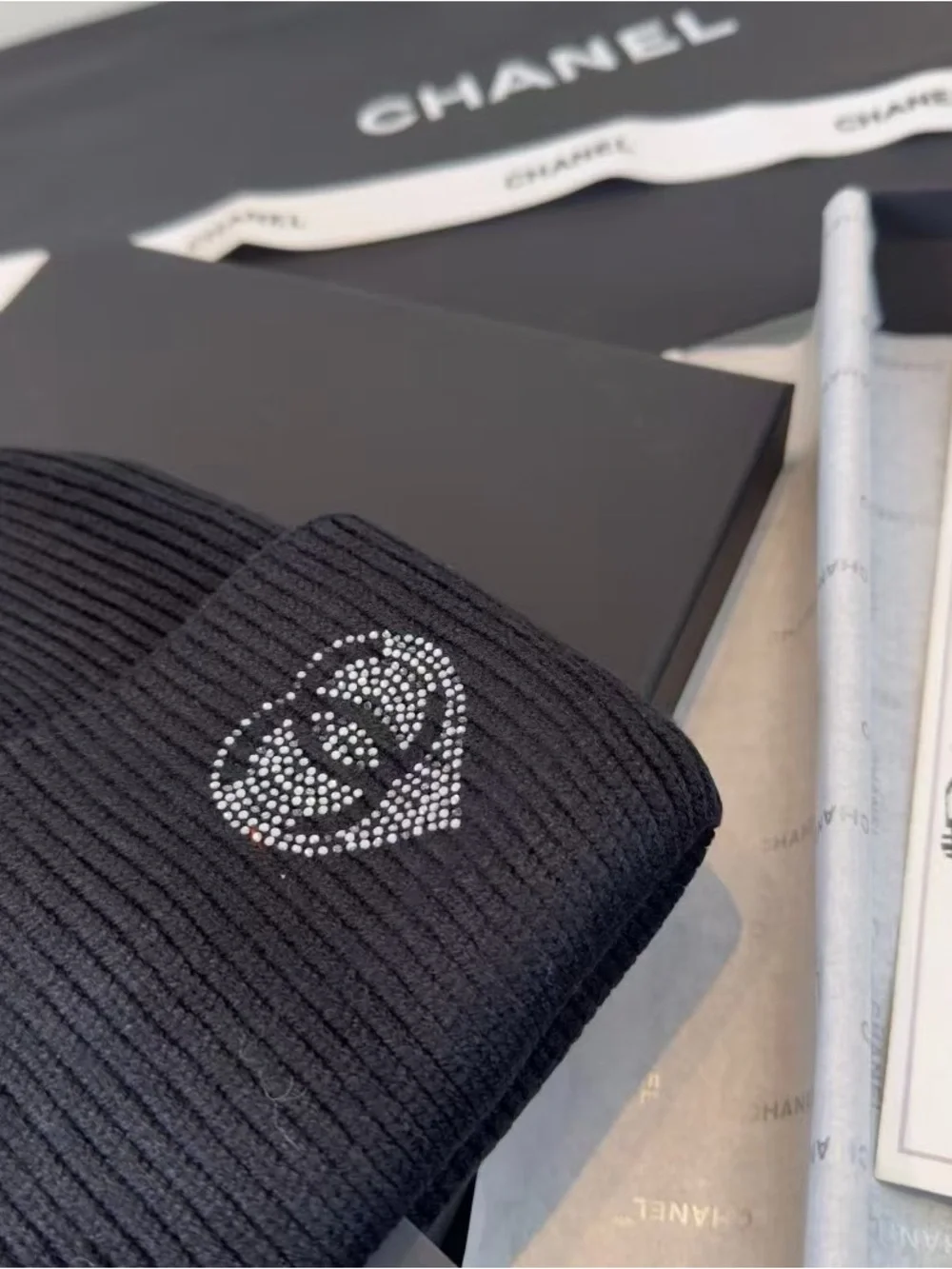 CHANEL Black Ribbed Kids Knit Beanie with Crystal Heart